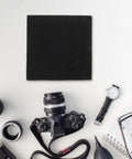 Black Foam Insert Packing Material With Extra Reinforcement For Fragile Gear Like Cameras Drones And Tools on desk