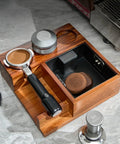 Solid Wood Espresso Tamper Holder Combo With Integrated Knock Box And Grounds Bin Fits Standard 58 Millimeter Portafilters, organized on countertop.