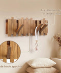 Premium Acacia Wood Wall Mounted Coat Rack With Eight Retractable Hooks, space saving flip down entryway stand view with key holder.
