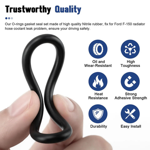 Close-up of black nitrile rubber radiator hose O-ring held between fingers.