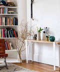 Living room with a console table using Metal Table Legs 28 Inch Adjustable F Shape Dining Desk Legs DIY Coffee Table Console Build Four Pack With Bolt Fixed Platform Anti Skid Pads Floor Protectors And Supports 0.8 To 1.9 Inch Thickness.