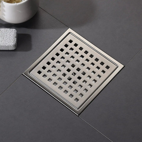 6 Inch Brushed Nickel Square Shower Drain With Adjustable Base Flange In SUS304 Stainless Steel on tiled floor
