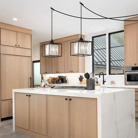 Plug In Pendant Light With Cord In Black Metal Cage And Crystal Accents over a kitchen island
