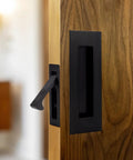 Two-Pack Sliding Pocket Door Handles In Black, Heavy Duty 304 Stainless Steel Recessed Flush Finger Pulls For Closet, Bathroom, Barn, And Cabinet Doors, Slick Space-Saving Hardware For Modern Homes on wooden door
