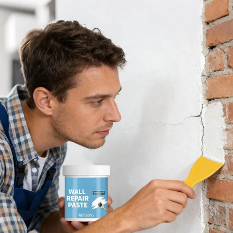 Man applying Hydrophobic Wall Putty For Quick Crack Repair And Easy Go To Application Durable Drywall Filling Compound with spatula