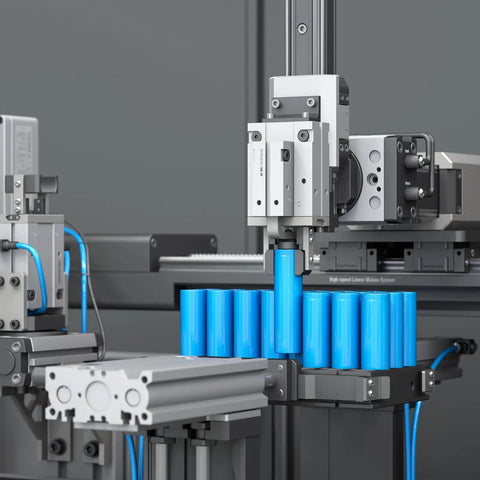 Automation system with blue cylindrical components and mechanical arms, in a high-speed linear motion setup.
