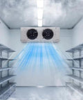 Inside view of Built Tough Industrial Walk In Freezer Cold Storage Room with cooling fans and metal shelving units.