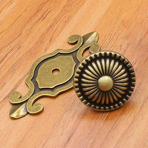 Four Pack Antique Brass Cabinet Knobs With Backplates Zinc Alloy Mushroom Dresser Drawer Knobs on wooden surface
