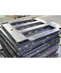 Heavy Duty Digital Pallet Scale With 5000 Pound Capacity And Roomy 48 By 48 Deck stacked metal pallets in warehouse setting.