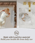 Top view of Brushed Gold Bathroom Sink Faucet With Waterfall Design, Widespread 8-Inch 3-Hole Mount, next to sleeping baby.