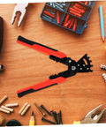 Badass Heavy Duty Wire Stripper And Crimper Pliers With Slick Bending Jaw Pro Grade Electrician Gear on a workspace surrounded by tools.