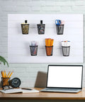 Six Piece Slatwall Cup Set With Hooks For Garage, Workshop, And Office Storage Metal Mesh Tool Holders on wall with stationery