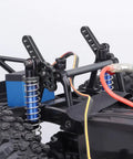 Aluminum Shock Mount Lift Kit Set For 1/10 Axial SCX10 SCX10 II 90046 D90 D110 RC Crawlers Black, CNC Machined 6061-T6 Upgrade, 4 Pack For Easy Shock Angle And Ride Height Adjustment installed on RC crawler.