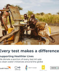 Children collecting water from a pump in a rural area, supported by charity initiatives mentioned below.