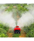 Heavy Duty Crawler Sprayer With Remote Control For Efficient Farm Irrigation And Pest Management Tracked Spraying Machine For Agricultural Fields Smooth Terrain Coverage spraying in an orchard.