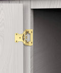 50 Pack Of 25 Pairs One Half Inch Overlay Self Closing Cabinet Hinges In Tough As Nails Polished Brass Gold Finish installed on kitchen cupboard.