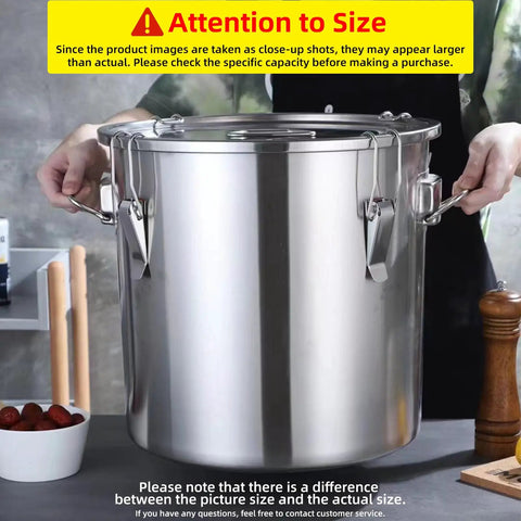 Close-up of Massive 304 Stainless Steel Airtight Food Storage Bin with Heavy Duty Locking Clamps being held for size reference.