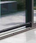 Sliding Door Security Bar Adjustable From 17 To 51 Inches Heavy Duty Interior Bar for Patio Doors and Windows installed at bottom.