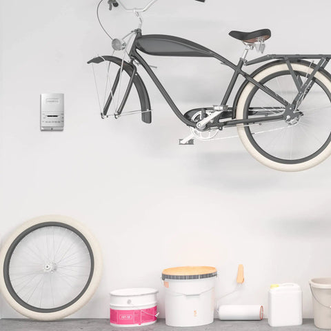 Garage wall with mounted manual thermostat for garage and outdoor buildings, non programmable white, no frills design