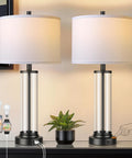Touch Control Table Lamps Set Of 2 With USB Ports And 3 Way Dimmable Bedside Lighting For Living Room And Bedroom Modern Black Nightstand Lamps With 2 LED Bulbs on a table