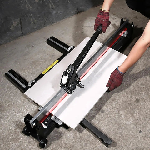 Manual Tile Cutter Pro Grade High Precision Tool with heavy duty all steel frame cutting a large tile on concrete floor