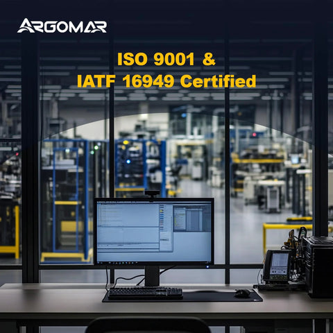 Computer screen displaying ISO 9001 and IATF 16949 certification in an industrial setting