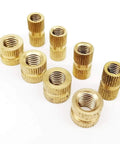 Premium Solid Brass Insert Nuts With Metric Thread For Injection Molding Projects Available In M3 M4 M5 And M6 Sizes displayed in a group.