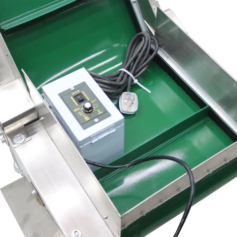 Close-up of Electric Inclined Climbing Conveyor Belt With Baffle showing control box on green aluminum PVC belt system