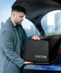 Man placing charger case into car trunk, related to Beefy Level 2 40A EV Charger For Tesla With 25 Ft Cable 240V NEMA 14 50 Plug ETL Listed NACS Connector IP66 Weatherproof Outdoor Home Wall Charger For Model Y 3 S X