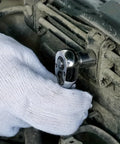 Hand using Mini Drive Ratchet Kit With Quick Release And Reversible 72 Tooth Design on car engine
