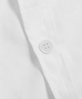 Close-up of a button detail on a Long Sleeve Lab Coat For Doctors, Nurses And Students, White Polyester Cotton Workwear