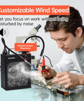 Person using solder fume extractor with HEPA and activated carbon filter portable smoke absorber for DIY soldering on workbench