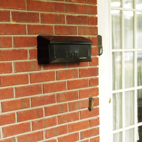 Townhouse Wall Mount Mailbox in Black, Small Capacity Galvanized Steel Build, Rust Resistant Powder Coat on brick wall
