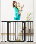 Extra Wide Baby Gate For Doorways 29.93 To 51.5 Inches, 30-Inch High With Auto-Close Walk-Thru Door, Super Safe Gate For Stairs And Hallways, Easy Setup, Perfect For Babies 6-24 Months, Black installed in doorway with woman holding baby