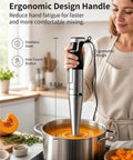 No Fuss Killer Handheld Immersion Blender With Pure Copper Motor And Variable Speed Controls Plus Chopper Whisk Frother Beaker Set in use with ergonomic handle.