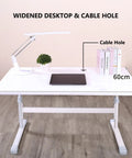 Rock Solid Manual Standing Desk With Easy Crank Adjustment Ergonomic Sit To Stand Workstation Table showing widened desktop and cable hole.
