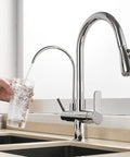 Two Handle Kitchen Sink Faucet With Pull Down Sprayer Hot And Cold Water Built In RO Filtration 3 In 1 Water Purifier Chrome Finish in use