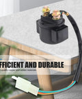 Heavy Duty Motorcycle Starter Relay 12 Volt Four Stroke Dirt Bike Kart Scooter Replacement Built Rock Solid For Scorching Trails Reliable Current Switch With Durable Black Shell on a countertop.