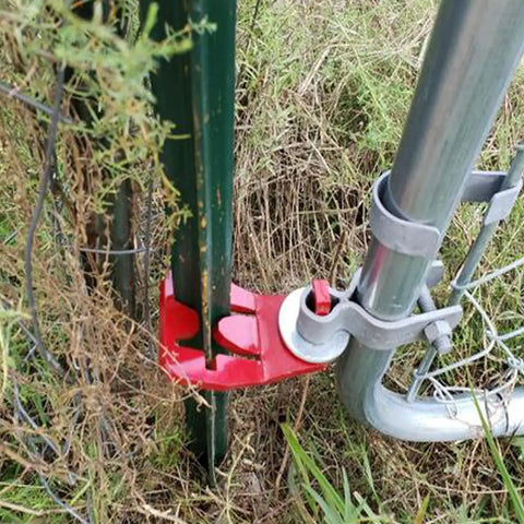 Rugged T-Post Gate Hinge Pins Set For Farm And Garden Gates on green post with red powder-coated steel bracket, fits 5/8 or 3/4 inch hinge eyes