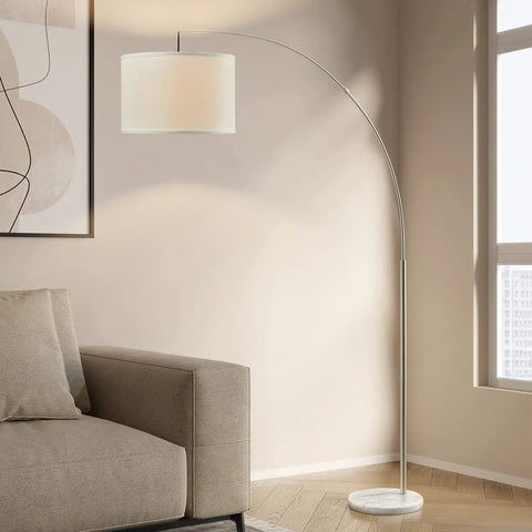 Modern Arc Floor Lamp With Brushed Steel Arch And Silver Finish Hanging Drum Shade Over Sofa For Reading In Living Room