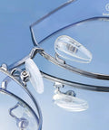 Gripping Silicone Air Bag Eyeglass Nose Pads Replacement Kit showcases clear silicone pads on metal frame glasses.