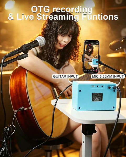 Musician using 10W Portable Acoustic Guitar Amp With Dual One Quarter Inch Inputs For Guitar And Microphone, OTG Recording