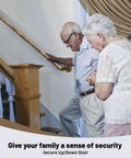 Heavy Duty Industrial Staircase Handrails 3 Ft Galvanized Pipe used by elderly couple for secure grip on indoor stairs.