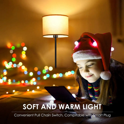 Girl reading under 58 Inch Floor Lamp Standing Bright Light With Beige Lampshade And Easy On Off Foot Pedal Simple Pole Style