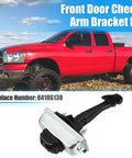 Front Door Check Arm Bracket Kit next to red truck in field