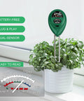 3 In 1 Soil Tester With Moisture, Light And pH Meter For Indoor Outdoor Use displayed in a plant pot with easy-to-read gauge.