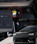 Yellow ABS Brake Fluid Reservoir Cap For Jeep Wrangler 2018, Cherokee 2014-2020 in engine bay close-up view