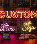 Custom neon sign with vibrant colors on a grid wall, floral decor on a tabletop