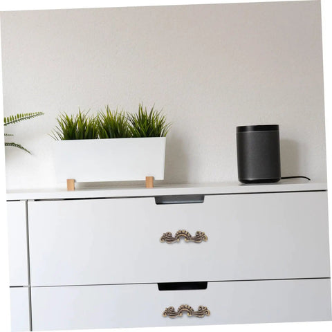 Old School Retro Wooden Cabinet Pulls Zinc Alloy Decorative Knobs Set Of 20 on white dresser with plant and speaker