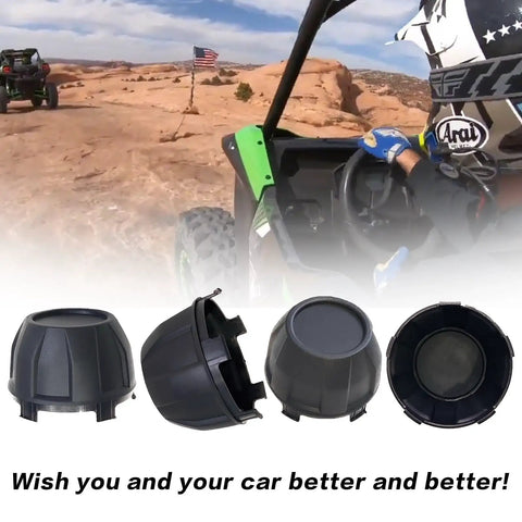 Hub Center Caps For Teryx KRX 1000 UTV Black Dust Finish 4 Pack Replacement 11065-1341 shown with off-road vehicle